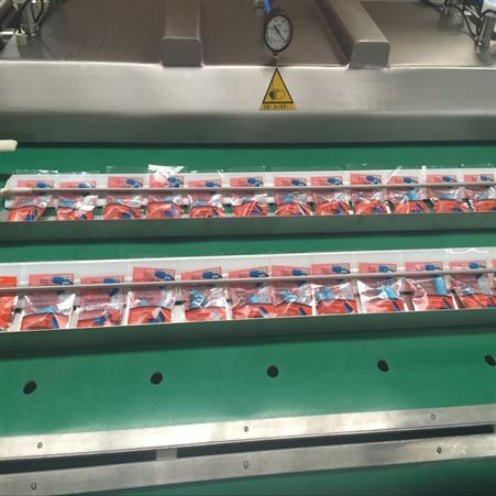 全自动袋装粽子抽真空机 海诺机械厂家生产1000型号滚动式真空包装机